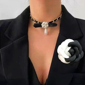 Elegant Black and White Camelia Brooch